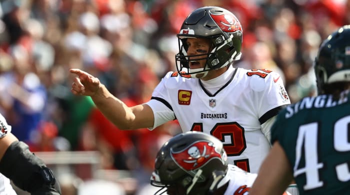 Jan 16, 2022; Tampa, Florida, USA; Tampa Bay Buccaneers quarterback Tom Brady (12) calls a play against the Philadelphia Eagles during the first quarter in a NFC Wild Card playoff football game at Raymond James Stadium.